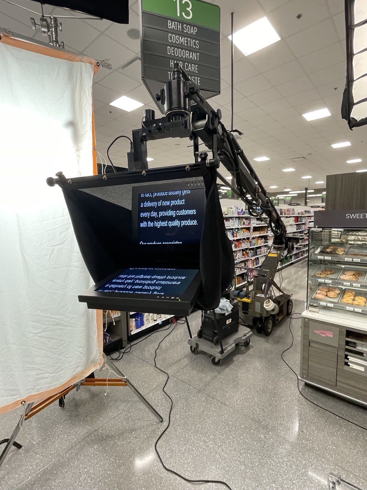 Camera-mount teleprompter on a jib arm for an in-store commercial shoot
